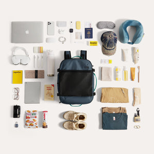 Blast_40L_travel_backpack-in-navy-blue_58a7a39e-2656-48ec-a51f-ed693432842e